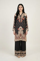 Woman wearing a patterned outfit with a plain background