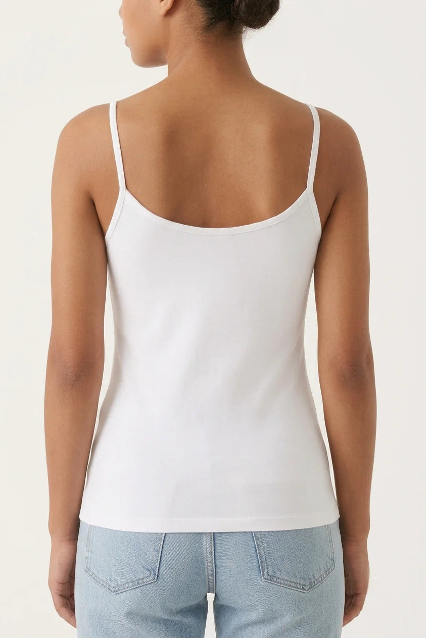 Back view of women's minimalist white spaghetti strap tank top base layer