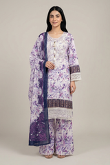 Woman wearing a floral purple and white outfit with a matching dupatta on a plain background