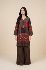 Woman wearing a patterned outfit on a beige background