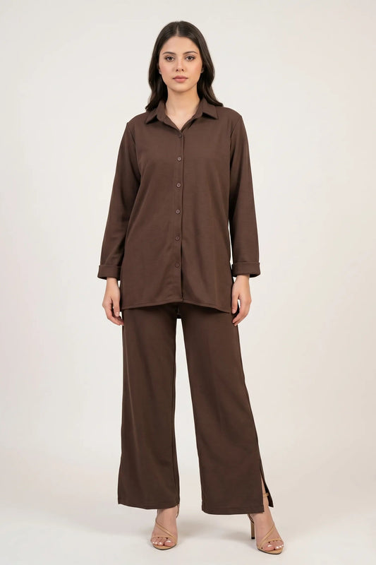 Woman wearing a brown outfit on a white background