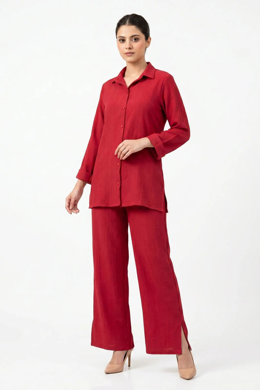 Woman wearing a red outfit on a white background