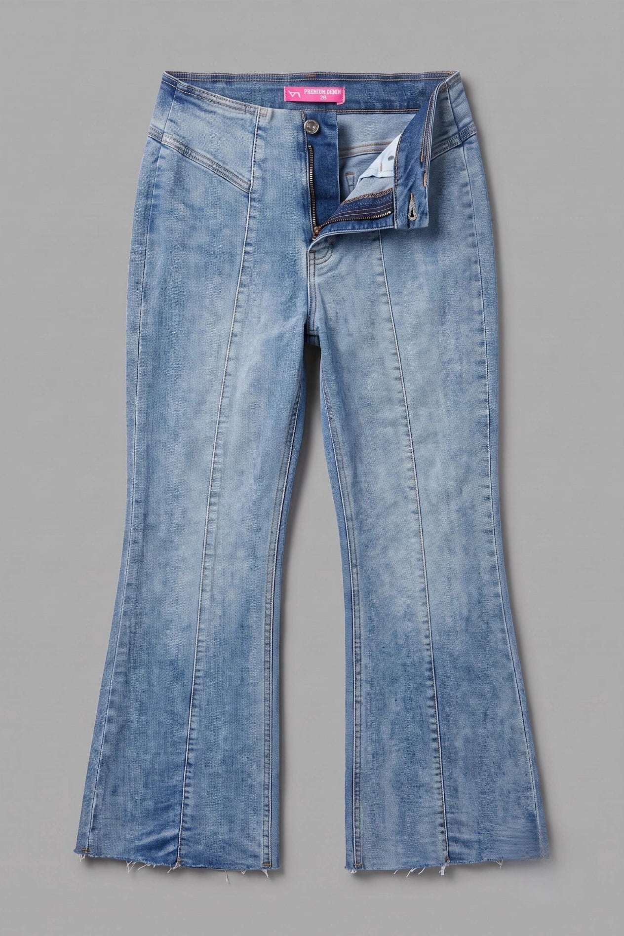 Light blue denim flare jeans with a faded wash, displayed flat against a solid gray background.
