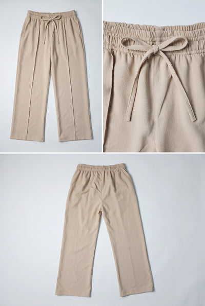 Three-panel product photo of beige drawstring pants shown flat against a light gray background, including a full-length view, a close-up of the waistband and tie, and another full-length view.
